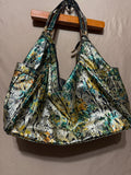 “TheFind” Bolso estilo Hobo Serpiente Metálica